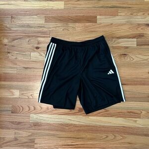 Adidas Black and White Athletic Shorts with Iconic Stripes